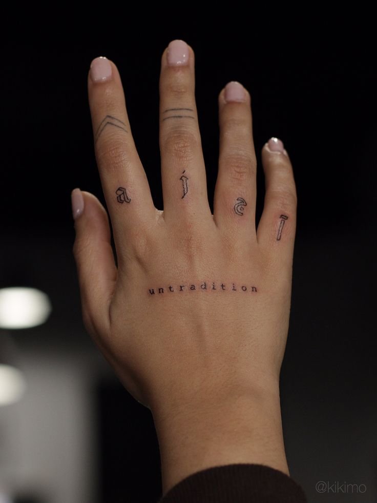 25 Tiny Hand Tattoo Ideas for Women That Are Trending in 2024
