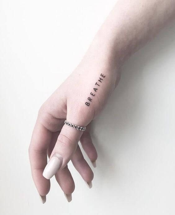 25 Tiny Hand Tattoo Ideas for Women That Are Trending in 2024