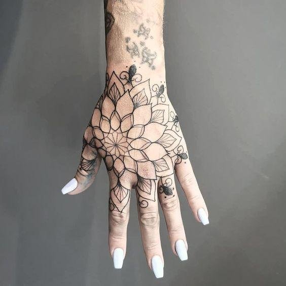 25 Tiny Hand Tattoo Ideas for Women That Are Trending in 2024