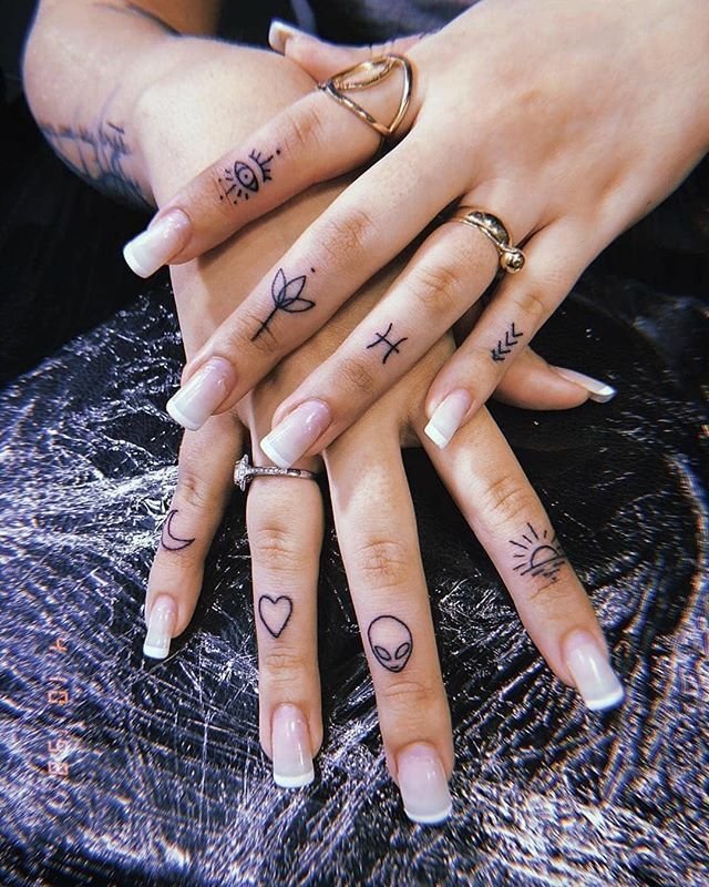 25 Tiny Hand Tattoo Ideas for Women That Are Trending in 2024