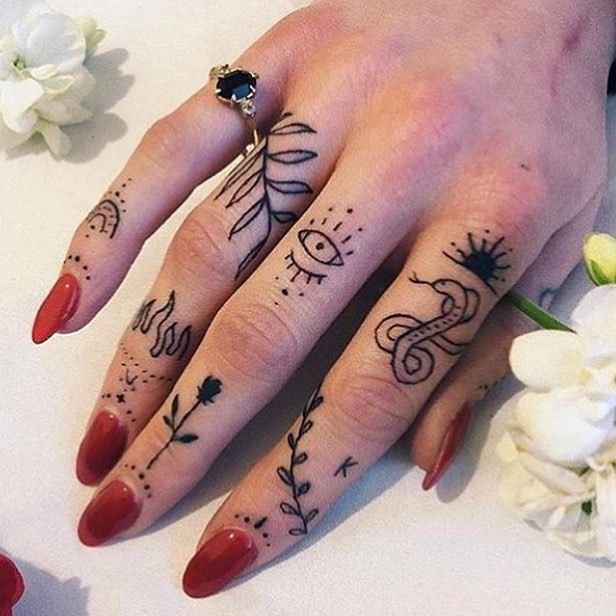 25 Tiny Hand Tattoo Ideas for Women That Are Trending in 2024