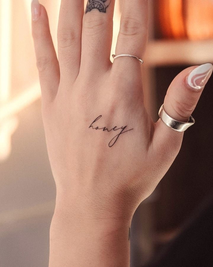 25 Tiny Hand Tattoo Ideas for Women That Are Trending in 2024