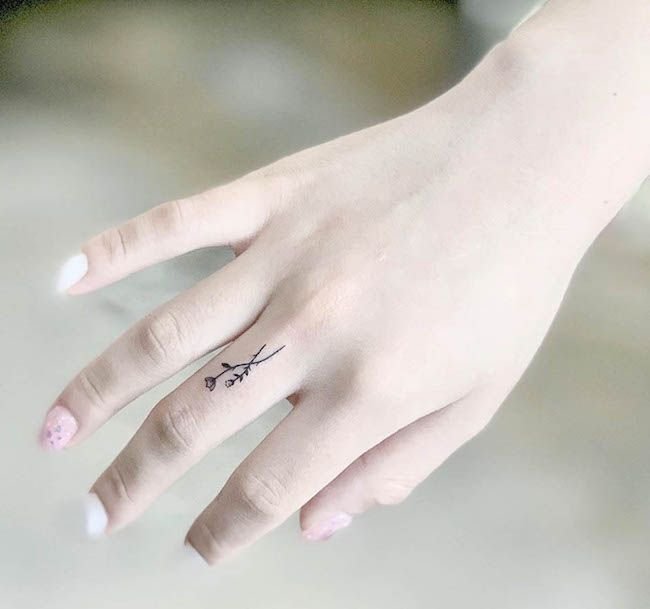 25 Tiny Hand Tattoo Ideas for Women That Are Trending in 2024