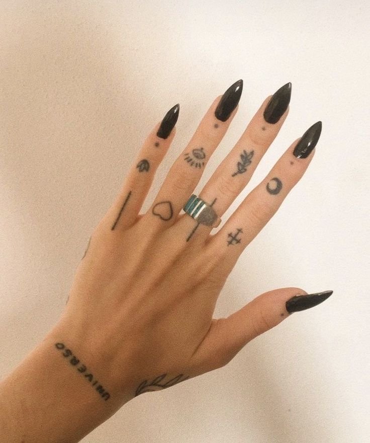25 Tiny Hand Tattoo Ideas for Women That Are Trending in 2024