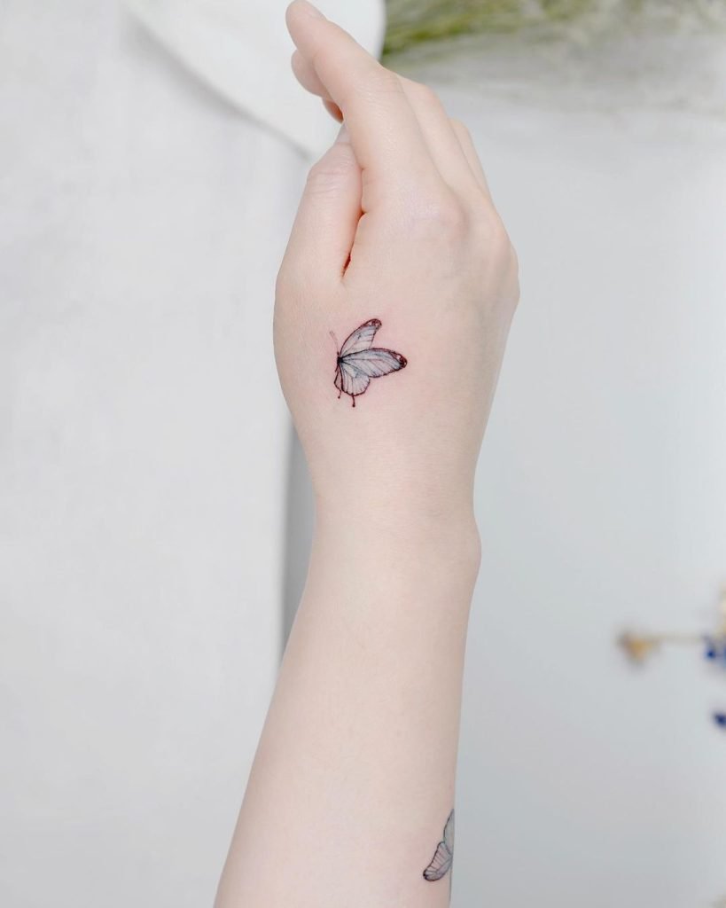 25 Tiny Hand Tattoo Ideas for Women That Are Trending in 2024