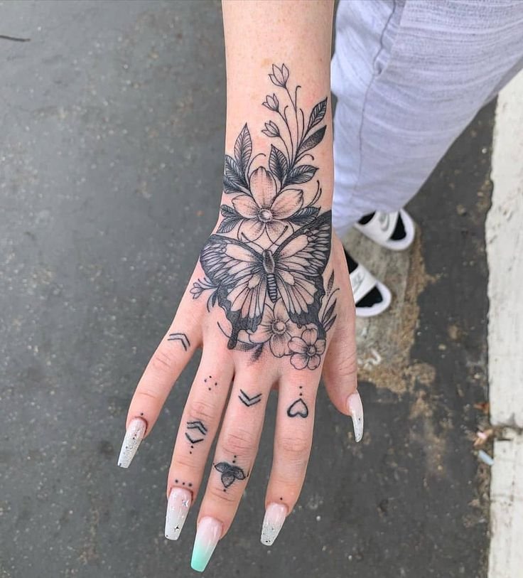 25 Tiny Hand Tattoo Ideas for Women That Are Trending in 2024